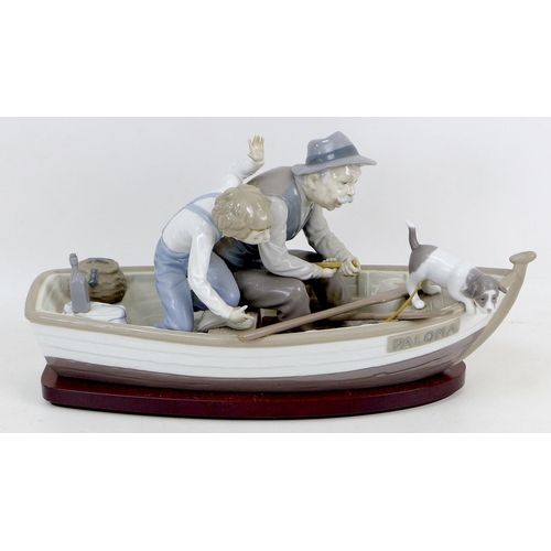 38 - A Lladro porcelain figure group, 'Fishing with Gramps', 5215, 39cm long, a/f, in original box.