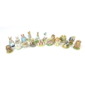 A collection of Beswick and Royal Albert Beatrix Potter figurines, comprising, three Royal Albert fi... 