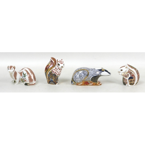 64 - Four Royal Crown Derby paperweights, modelled as a a 