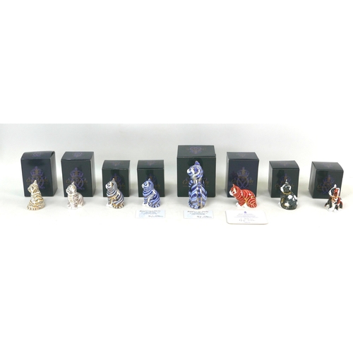 66 - Seven Royal Crown Derby paperweights, modelled as a limited edition 