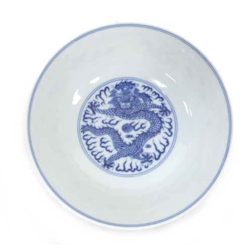 7 - A Chinese porcelain blue and white bowl, 20th century, bearing a six character Qing dynasty mark to ... 