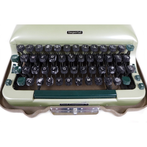 72 - A 20th century Imperial 'Good Companion 5' portable typewriter, in pale green, with two keys, origin... 