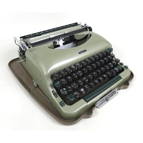 72 - A 20th century Imperial 'Good Companion 5' portable typewriter, in pale green, with two keys, origin... 