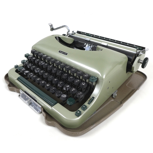 72 - A 20th century Imperial 'Good Companion 5' portable typewriter, in pale green, with two keys, origin... 