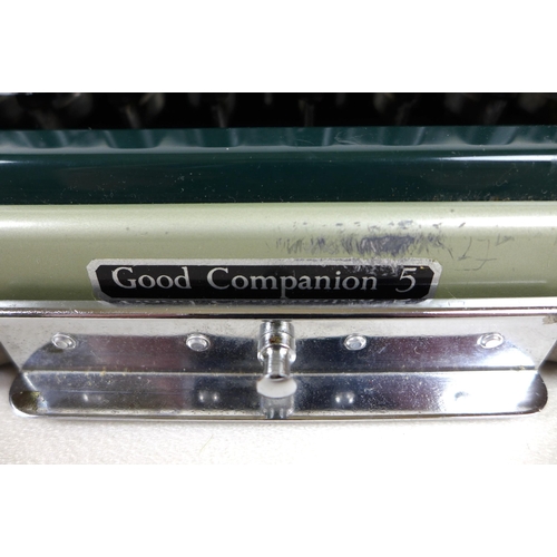 72 - A 20th century Imperial 'Good Companion 5' portable typewriter, in pale green, with two keys, origin... 