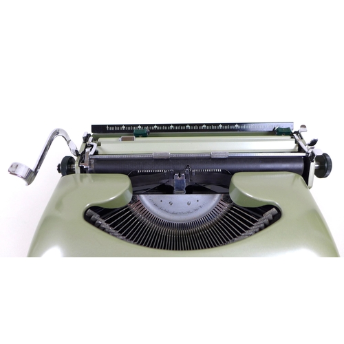 72 - A 20th century Imperial 'Good Companion 5' portable typewriter, in pale green, with two keys, origin... 