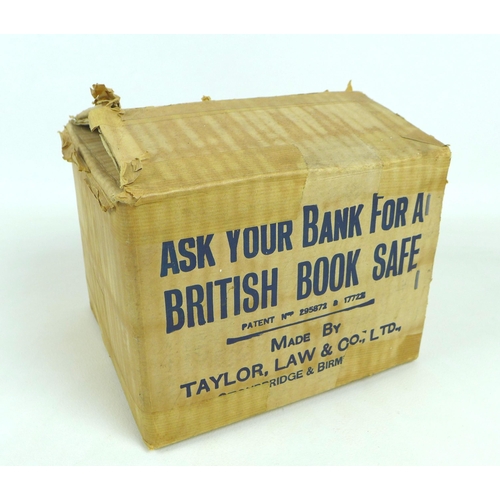 73 - A collection of British book safes and piggy banks, mainly from Lincolnshire and surrounding countie... 