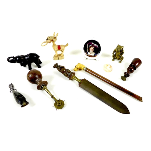 84 - A mixed group of 19th and 20th century collectables, comprising a seal with turned wooden handle, 8c... 