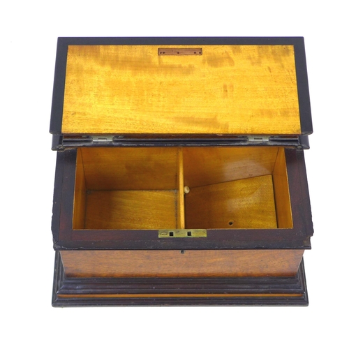 94 - An Edwardian oak casket box, with ebonised edges, lift lid opening to reveal a satinwood lined inter... 