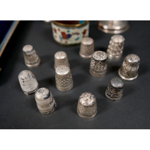 12 - A group of small silver items, including a cased set of six pistol grip butter knives, a cased chris... 