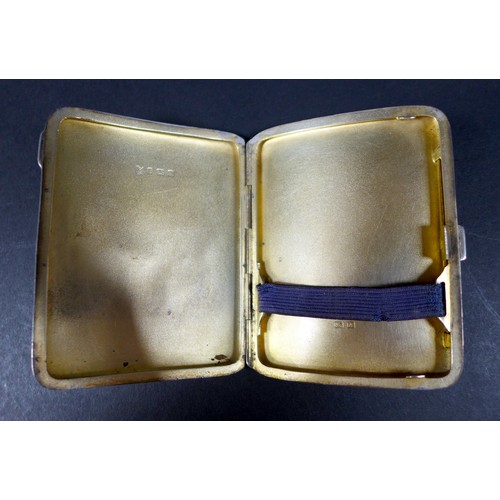 32 - Four Victorian and later silver cigarette cases, comprising an Edwardian case with bright cut decora... 
