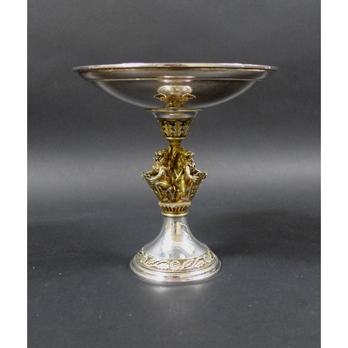 38 - An Elizabeth II silver gilt commemorative 'Herald's' tazza, the shallow bowl with rose and oak leaf ... 