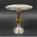 An Elizabeth II silver gilt commemorative 'Herald's' tazza, the shallow bowl with rose and oak leaf ... 