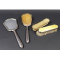 An Art Deco silver and yellow enamel backed dressing table set, decorated with wavy lined guilloche ... 