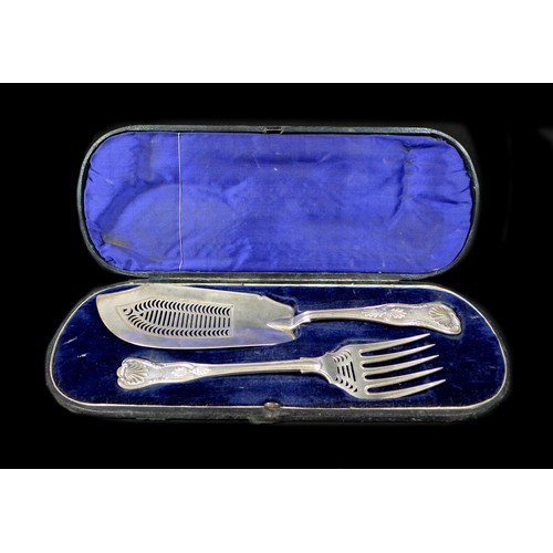 25 - A matched set of Victorian silver fish servers, comprising a George IV silver pierced fish server, W... 