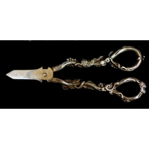 21 - A pair of Edward VII silver grape scissors, with ornate cast handles decorated with fruiting vines, ... 