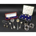 A group of silver items, comprising a cased set of six coffee spoons, a cased 1937 Coronation Souven... 
