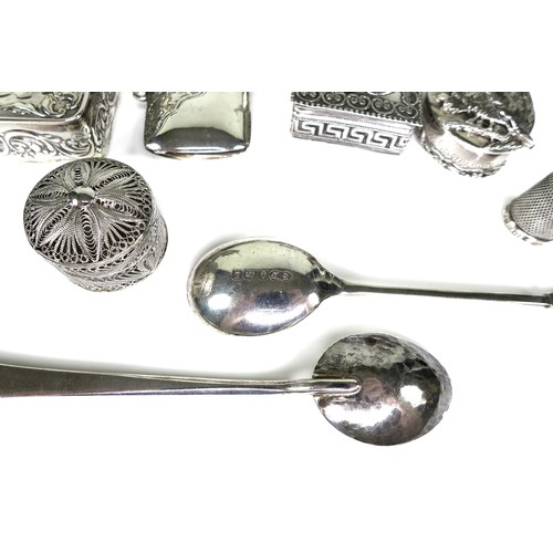 14 - A group of small silver and white metal items, including two Victorian silver vesta cases, two silve... 