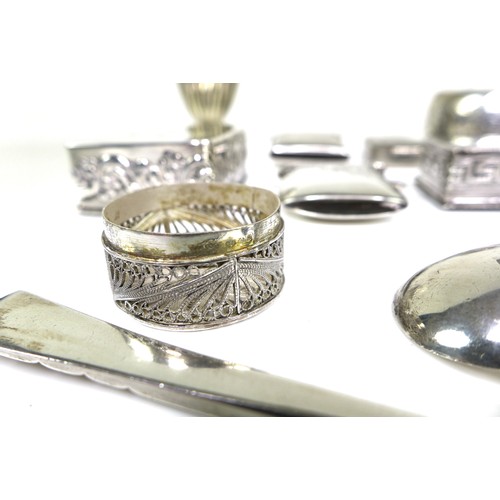 14 - A group of small silver and white metal items, including two Victorian silver vesta cases, two silve... 
