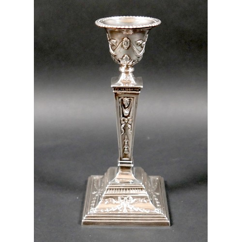 4 - An ERII silver single candlestick, of stepped square section, with removable nozzle, decorated in Ne... 