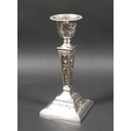 An ERII silver single candlestick, of stepped square section, with removable nozzle, decorated in Ne... 