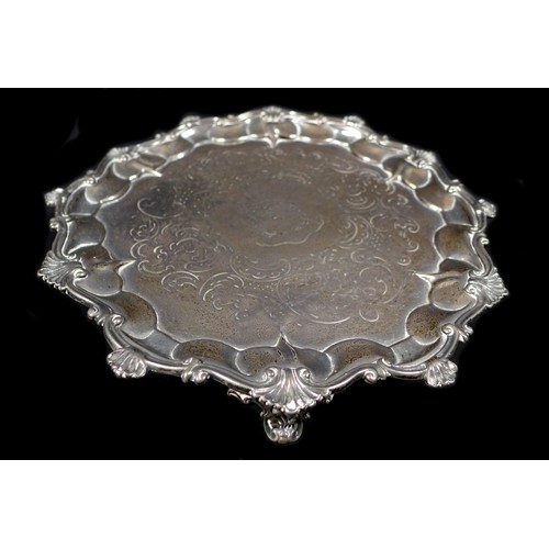 35 - A Victorian silver tray, with shell mounts, raised upon four scroll feet, Daniel & Charles Houle, Lo... 