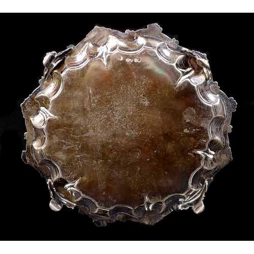 35 - A Victorian silver tray, with shell mounts, raised upon four scroll feet, Daniel & Charles Houle, Lo... 