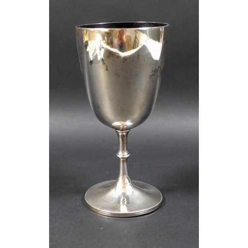 19 - A Victorian silver trophy cup or chalice, with plain unengraved bowl, knopped stem and circular foot... 