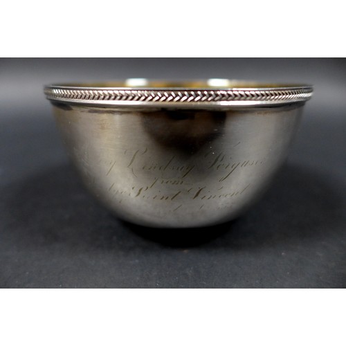 20 - A group of four silver items, comprising a George V silver bowl, gilt lined, with chevron border to ... 