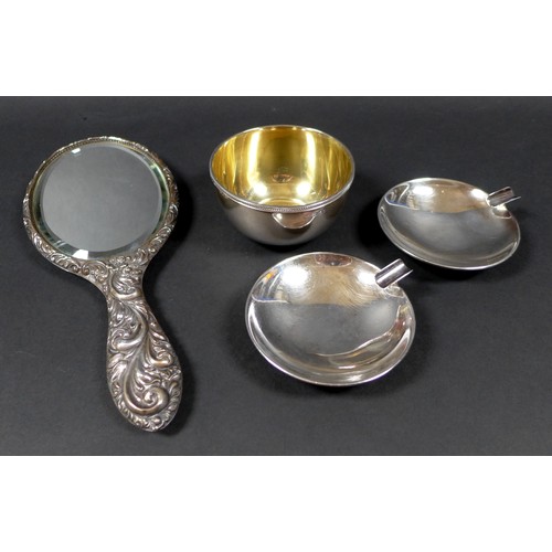 20 - A group of four silver items, comprising a George V silver bowl, gilt lined, with chevron border to ... 