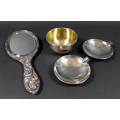 A group of four silver items, comprising a George V silver bowl, gilt lined, with chevron border to ... 
