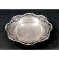 A George V silver pedestal bowl, with shaped rim, pierced edges and circular foot, Mappin & Webb Ltd... 