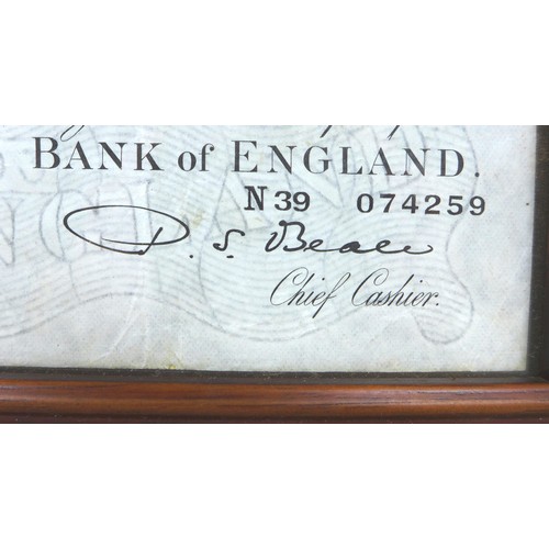 51 - A collection of British bank notes, including a Bank of England white five pound note, Chief Cashier... 