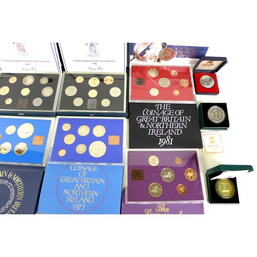 54 - A collection of ERII proof and other coins, including four Royal Mint United Kingdom Proof Coin coll... 