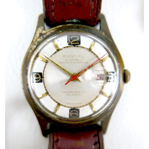 92 - A group of four wristwatches, including a Randall gold plated gentleman's wristwatch, 34mm case on b... 