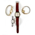 A group of four wristwatches, including a Randall gold plated gentleman's wristwatch, 34mm case on b... 