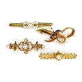 A group of four 9ct gold and cultured pearl brooches, including one of snaffle design, 5.4cm, and on... 