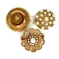 A group of three 9ct gold and cultured pearl circular brooches, one of bi-coloured gold, 3.4cm diame... 