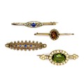 A group of four 9ct gold brooches, including two set with sapphires and seed pearls, largest 5.1cm, ... 