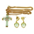 A 9ct gold, jade and diamond cross pendant, 3.1 by 2.3cm, on a 9ct gold chain, 29cm long fastened, 1... 