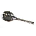 A white metal tennis racquet and ball tie pin, with pierced decoration to the racquet head, unmarked... 
