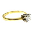 An 18ct yellow gold and diamond solitaire ring, the princess cut stone approximately 4.5 by 4.3 by 3... 