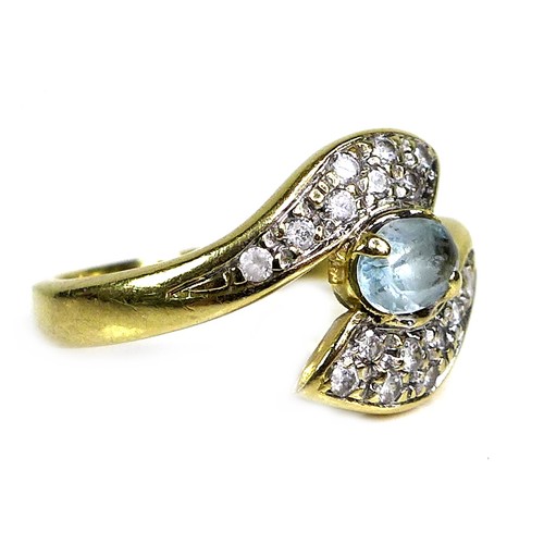 267 - An 18ct gold and aquamarine ring, the oval cut stone of pale blue colour, approximately 6 by 4 by 3m... 