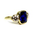 An 18ct gold, sapphire and diamond ring, the royal blue sapphire of approximately 9.33 by 7.5 by 4.9... 