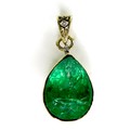 An 18ct gold and emerald pendant, the pear shaped stone 14 by 11 by 7.7mm, a/f, with 1.5mm diamond t... 