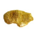 A yellow metal nugget, testing as 18ct gold, 9.1g, 2.5 by 1.5 by 0.4cm.
Provenance: found by vendors... 