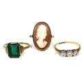 Three 9ct gold rings, comprising an illusion set diamond ring, size M, a cameo ring, size L, and an ... 
