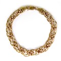 A 9ct Italian gold fancy link chain bracelet, 0.8 by 19cm long, 7.9g.