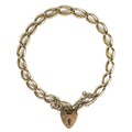 A 9ct gold chain bracelet with padlock clasp and safety chain, 16.2g, 21cm long.