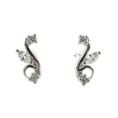 276A - A pair of 18K white gold and diamond earrings, formed as flowers, set with a marquise cut stone, 4.0... 